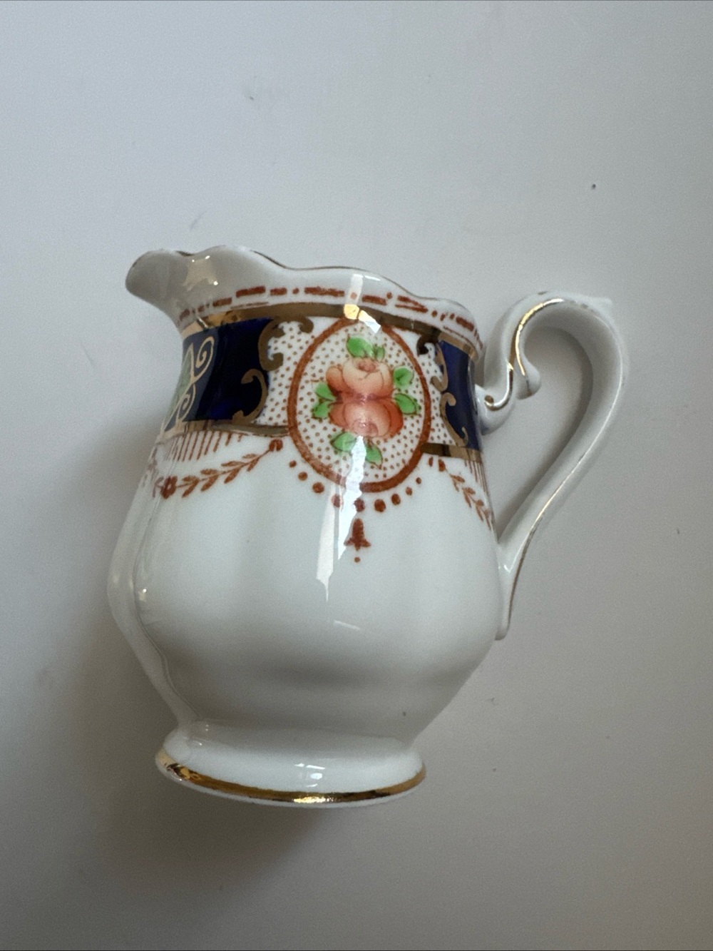 Royal Albert White Porcelain Floral Accent Pitcher with Gold Trim